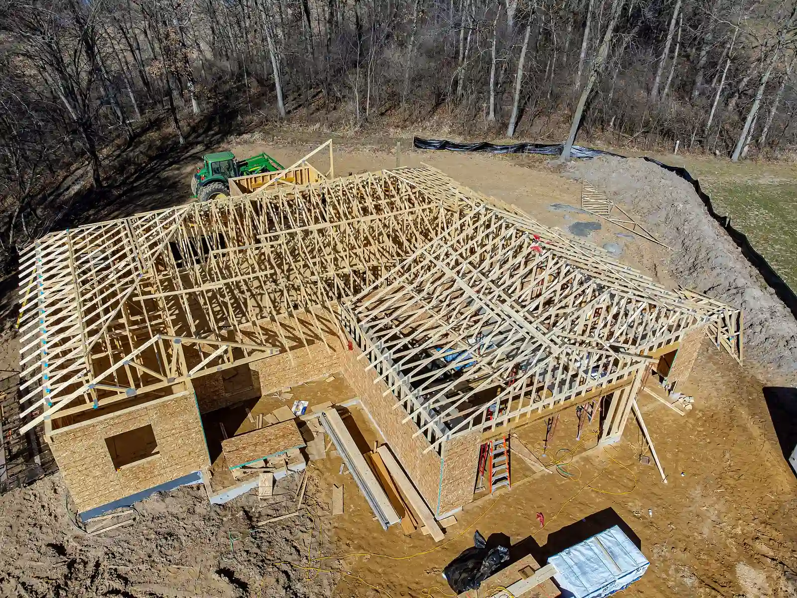 Aerial view of a single-storey house framed with roof trusses