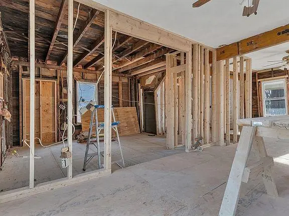 House interior stripped to the studs with new framing during a renovation